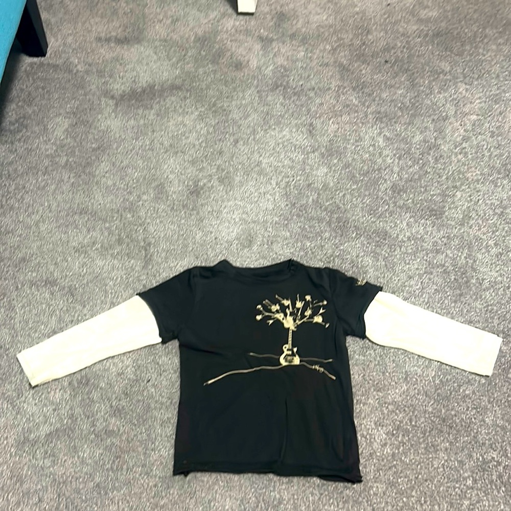 Short sleeve shirt with thermal long sleeves sewn in